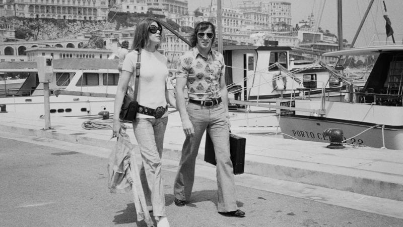 Jackie and Helen Stewart walk alongside Monaco harbour in 1971