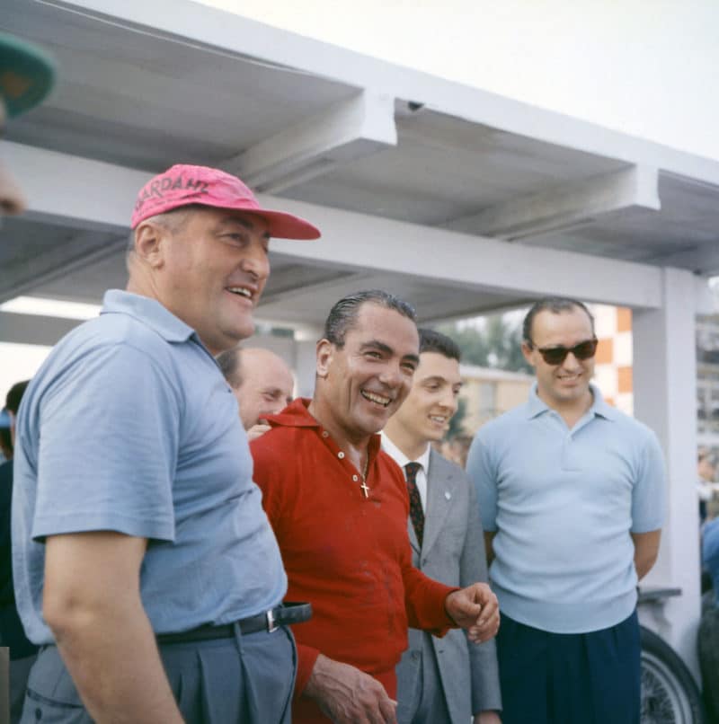 Jean Behra (in red) pictured in1957 at the Grand Prix