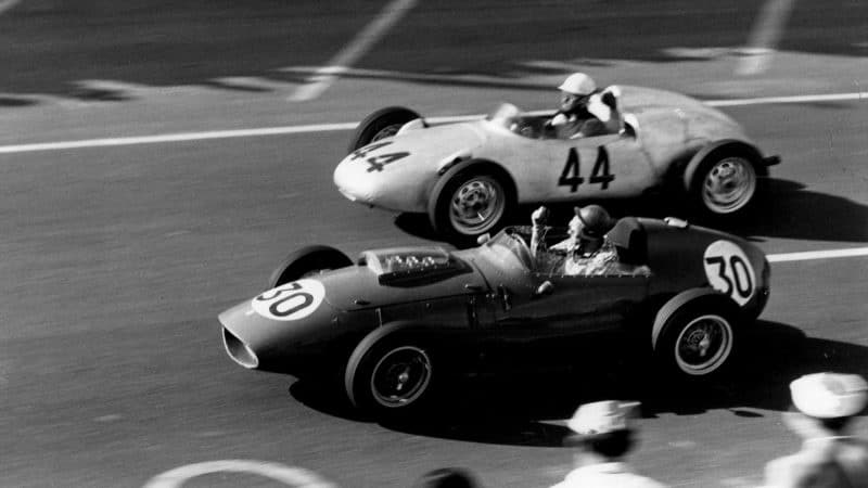 Jean Behra passes Ron Flockhart in the 1959 French Grand Prix