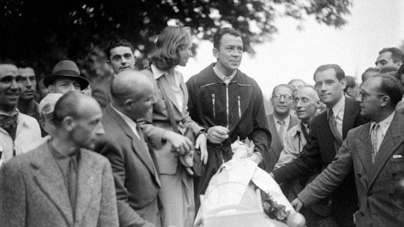 Jean-Pierre Wimille after winning at the Bois de Boulogne in 1945