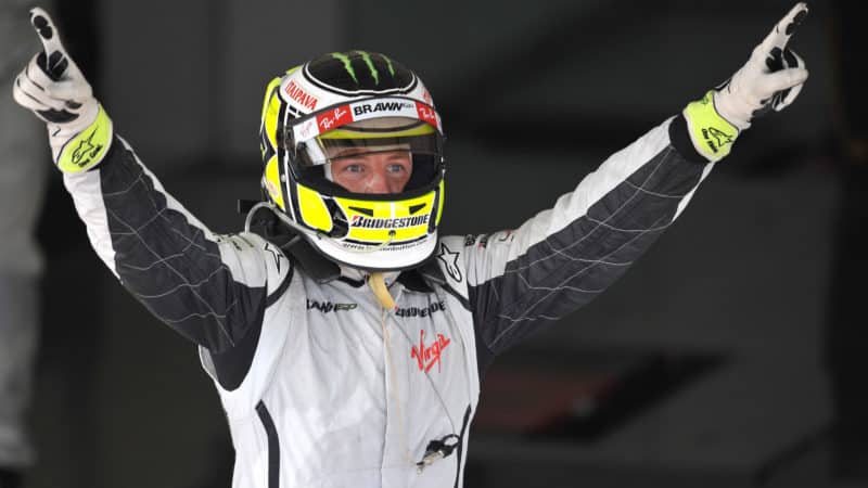 Jenson Button celebrates becoming F1 World champion at the 2009 Brazilian GP