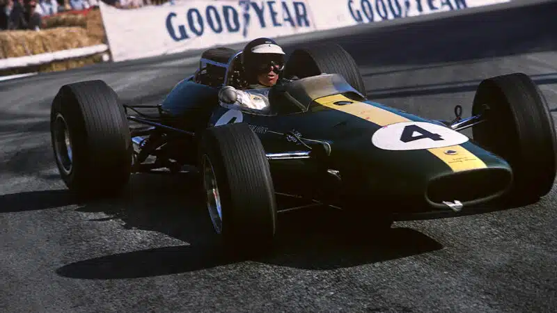 Jim Clark slides around a corner in his Lotus at the 1966 F1 Monaco Grand Prix