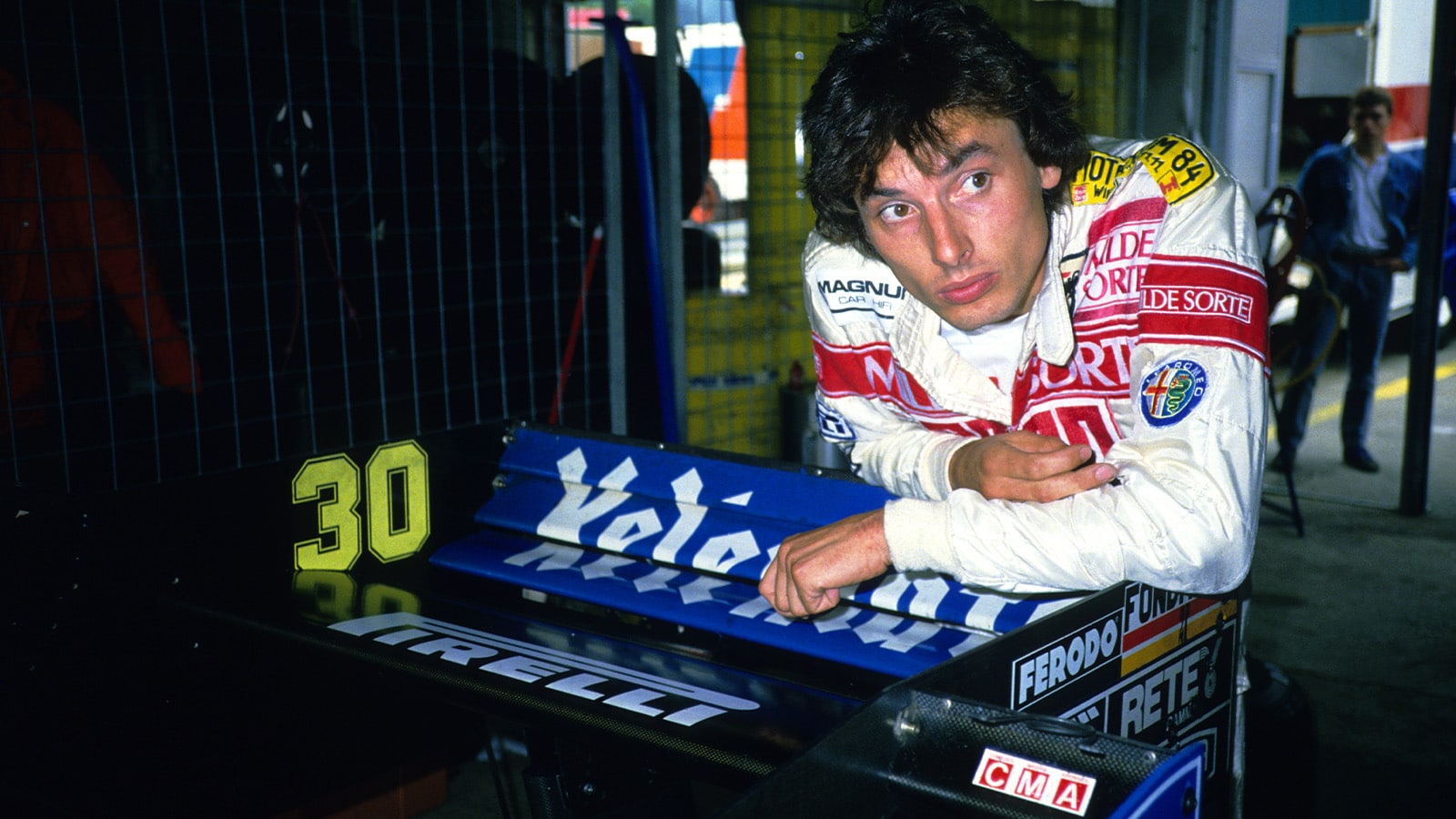 Jo Gartner leans on Osella rear wing in 1984