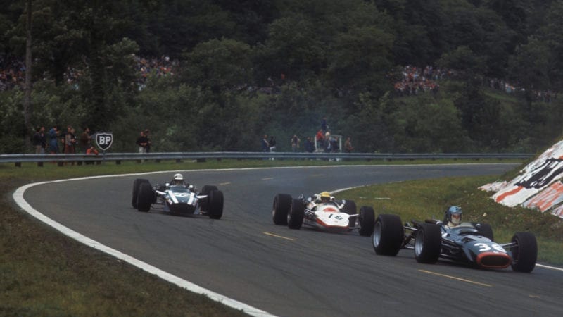 Jo Schlesser Piers Courage and Vic elfors on the opening lap of the 1968 French Grand Prix at Rouen les Essarts