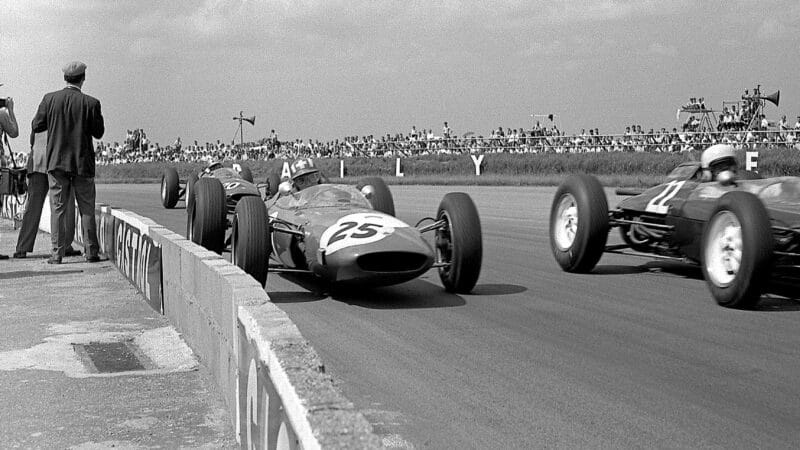 Jo Siffert Mike Hailwood and Bob Anderson in 1963 British Grand Prix
