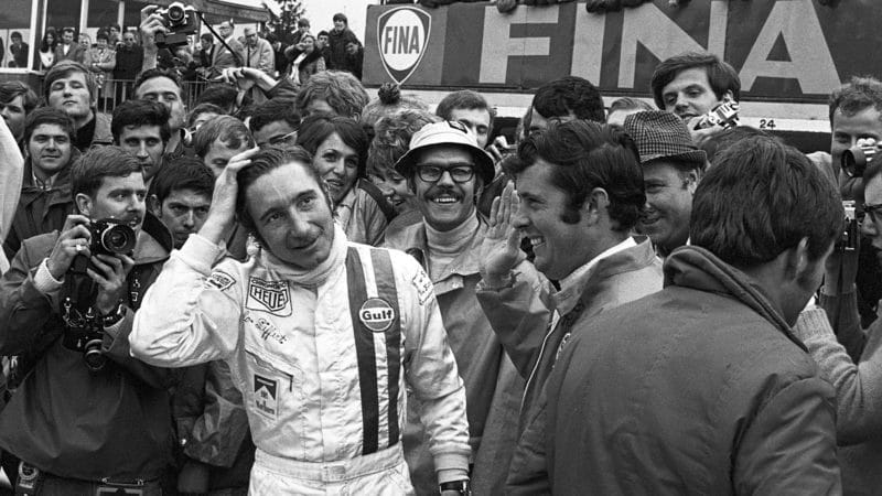 Jo Siffert and Brian Redman surrounded by photographers after winning 1970 1000km of Spa