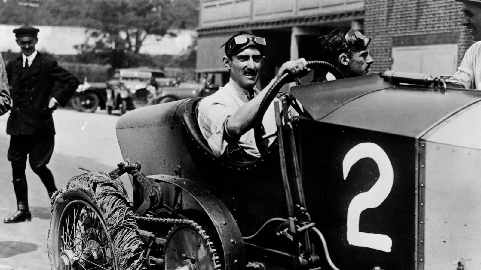 Louis Zborowski at the wheel of Chitty Bang Bang I, Brooklands, 1922. With a burst tyre after readching a speed of 125mph. Zborowski built three aero-engined cars all called Chitty Bang Bang. Chitty I's first win was the 100mph Brooklands Short Handicap at a speed of 100.75 mph. By the summer of 1921 Chitty 2 was under construction. Both Chittys ran at the 1921 autumn season at Brooklands. During the Whitsun 1922 Brooklands meeting Chitty 1 achieved her fastest lap of 113.45 mph. The 'Chitty Chitty Bang Bangs' were immortalised in the famous film 'Chitty Chitty Bang Bang'. (Photo by National Motor Museum/Heritage Images/Getty Images)