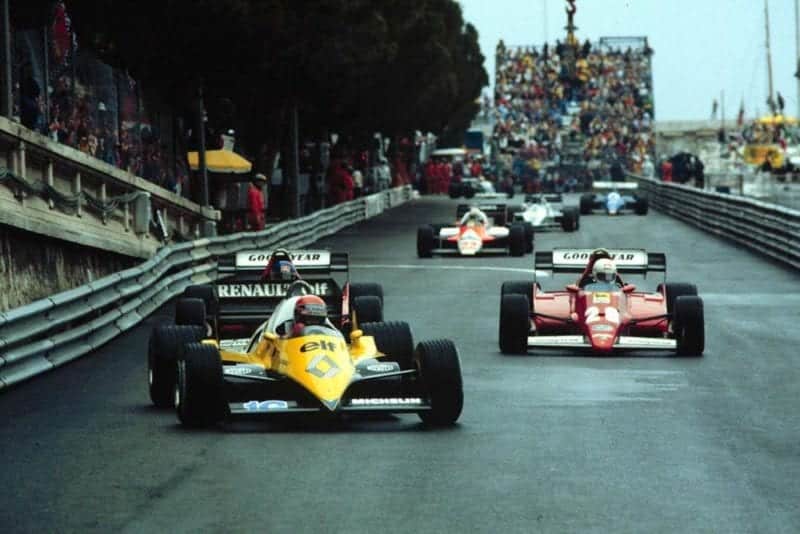 Front row man Rene Arnoux and team mate Patrick Tambay hound Eddie Cheever in the first few laps.