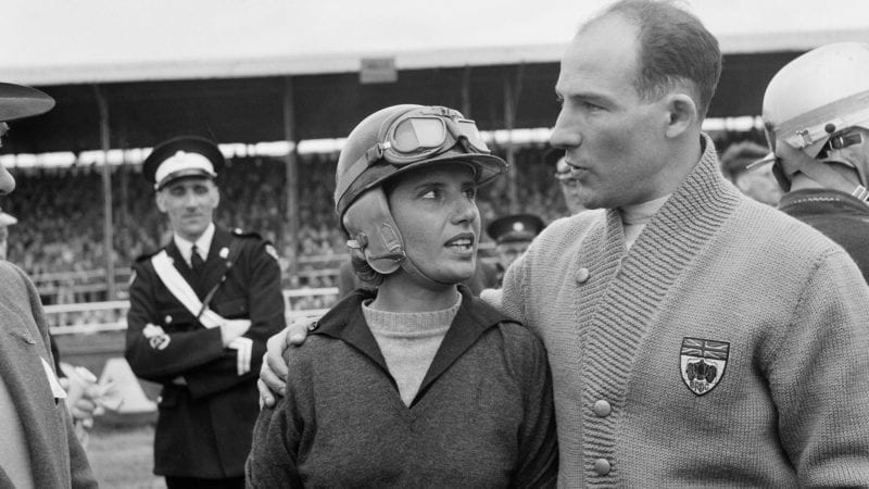 Maria Teresa de Filippis with Stirling Moss at SIlverstone in 1959