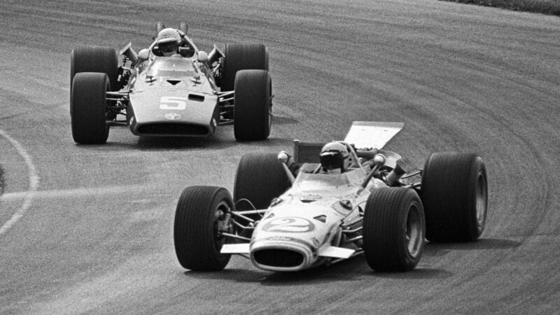 Mario Andretti leads Al Unser in the USAC Championship Trail Indianapolis Raceway Park 200, a two heat race, run on July 21, 1968 at Clermont, Indiana.