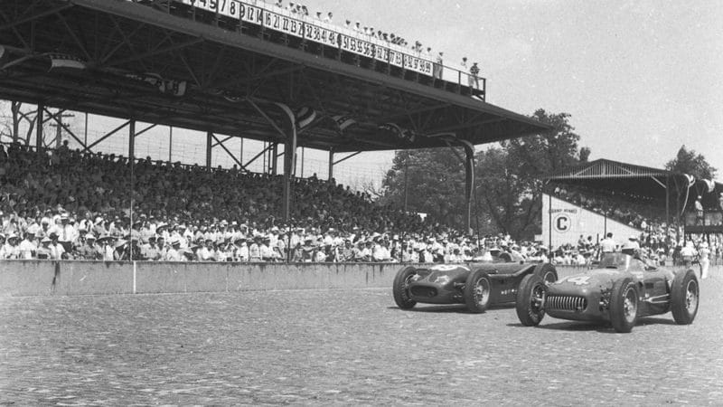 May 30, 1953- Pole sitter Bill Vukovich (No. 14) and second-starting Fred Agabashian (No. 59) head out for pace laps prior to the running of the Indianapolis 500 AAA Indy Car race at Indianapolis Motor Speedway