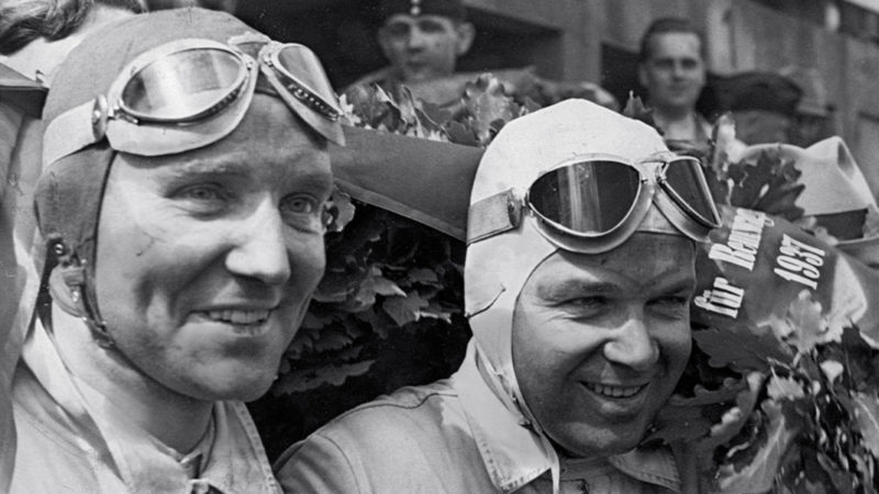 Mercedes-GP-driver-Manfred-von-Brauchitsch-on-the-podium-with-Rudolf-Caracciola-at-the-1937-German-GP