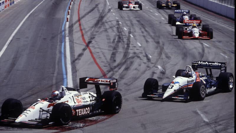 Michael Andretti (USA) leads Al Unser Jr. (USA) during the running of the 1992 Long Beach Grand Prix.