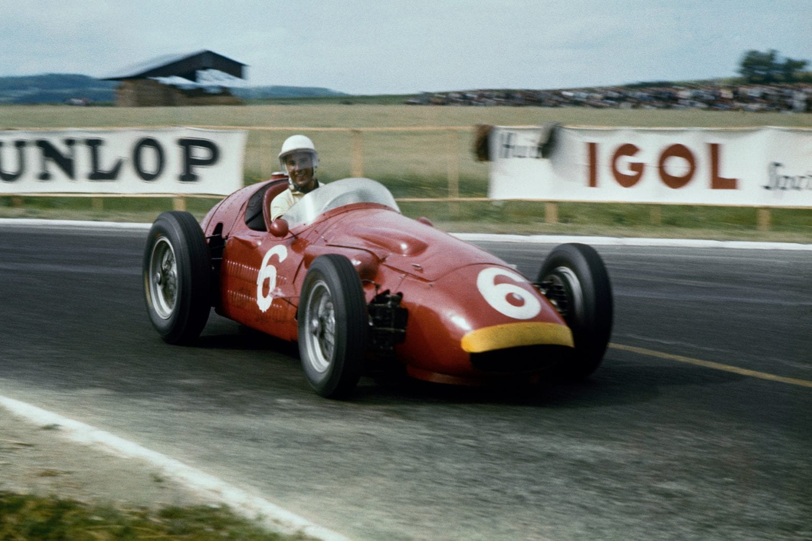 Stirling Moss (Maserati 250F), on his way to 5th place at the 1956 French Grand Prix, Reims.