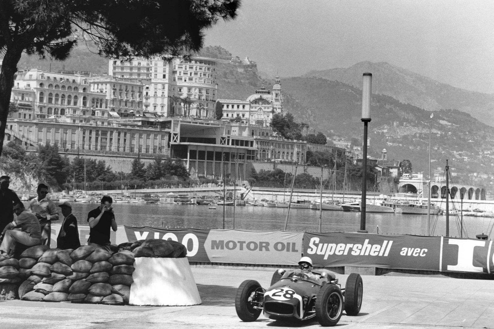 Stirling Moss rounds the gasworks hairpin on his way to Monaco victory