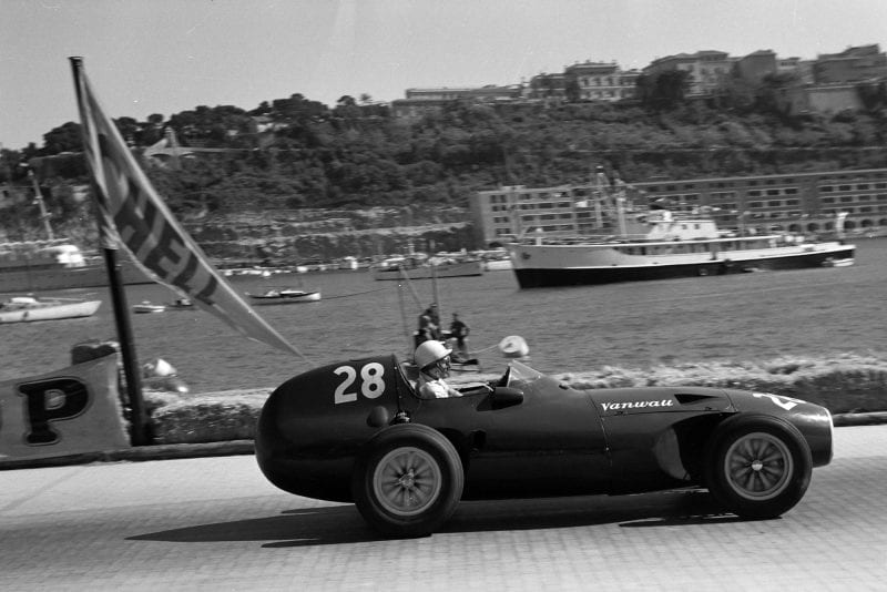 Stirling Moss races by the harbour in his Vanwall at the 1958 Monaco Grand Prix.