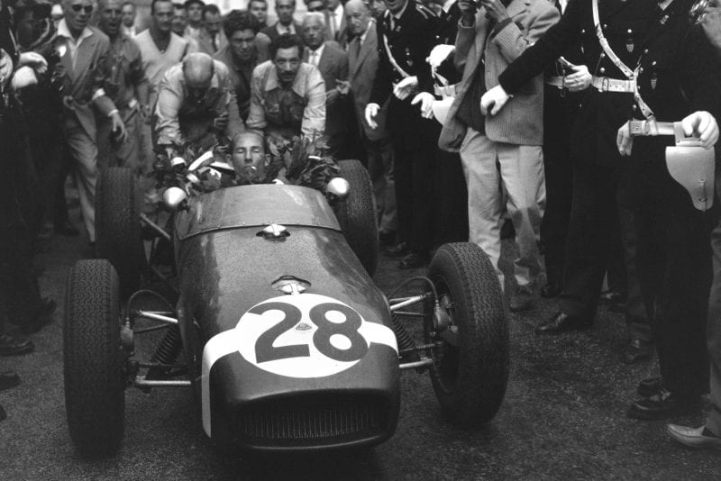 Stirling Moss celebrates victory