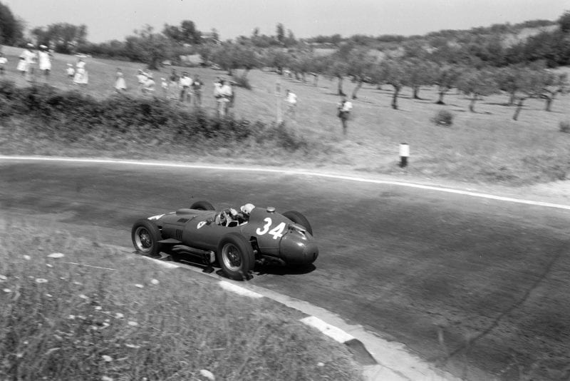 Luigi Musso pushing hard in his Ferrari at the 1957 Pescara Grand Prix.