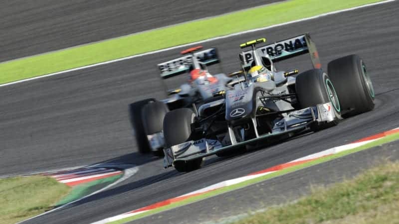 Nico Rosberg leads Mercedes team-mate Michael Schumacher at Suzuka in the 2010 Japanese Grand Prix