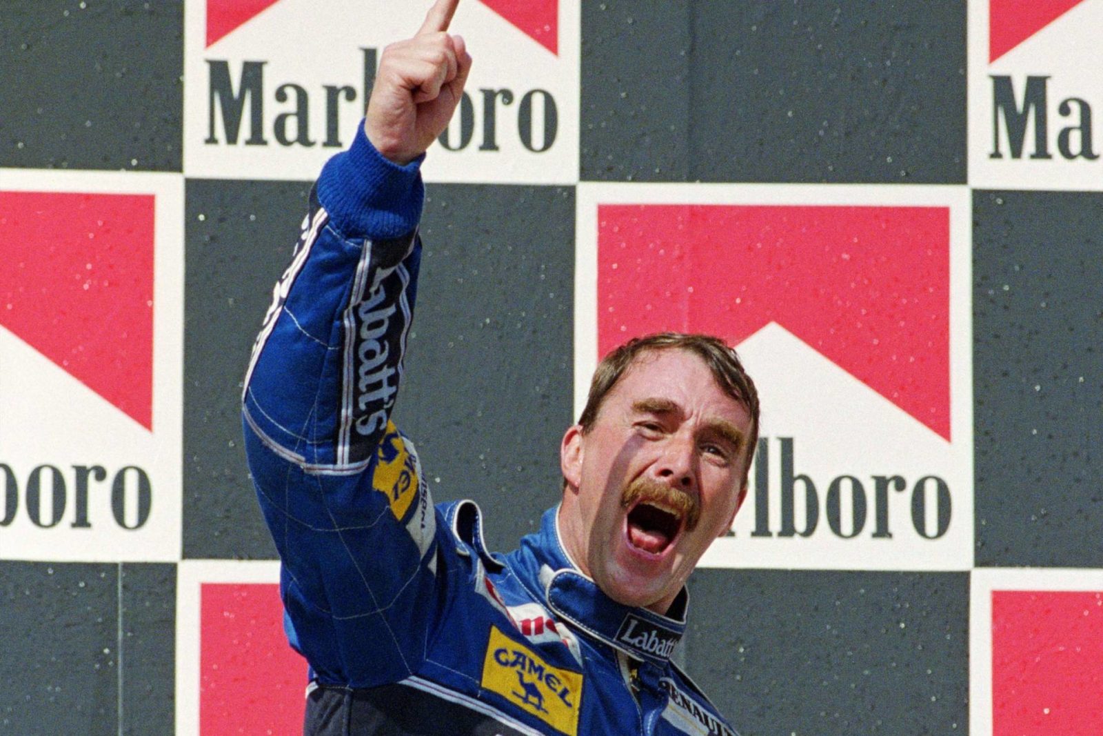 Nigel Mansell celebrates winning the 1992 F1 championship at the Hungarian Grand Prix