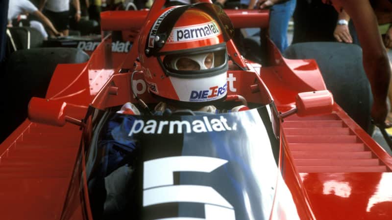 Niki Lauda Driving His Brabham-Alfa Romeo Down the Pitlane…
