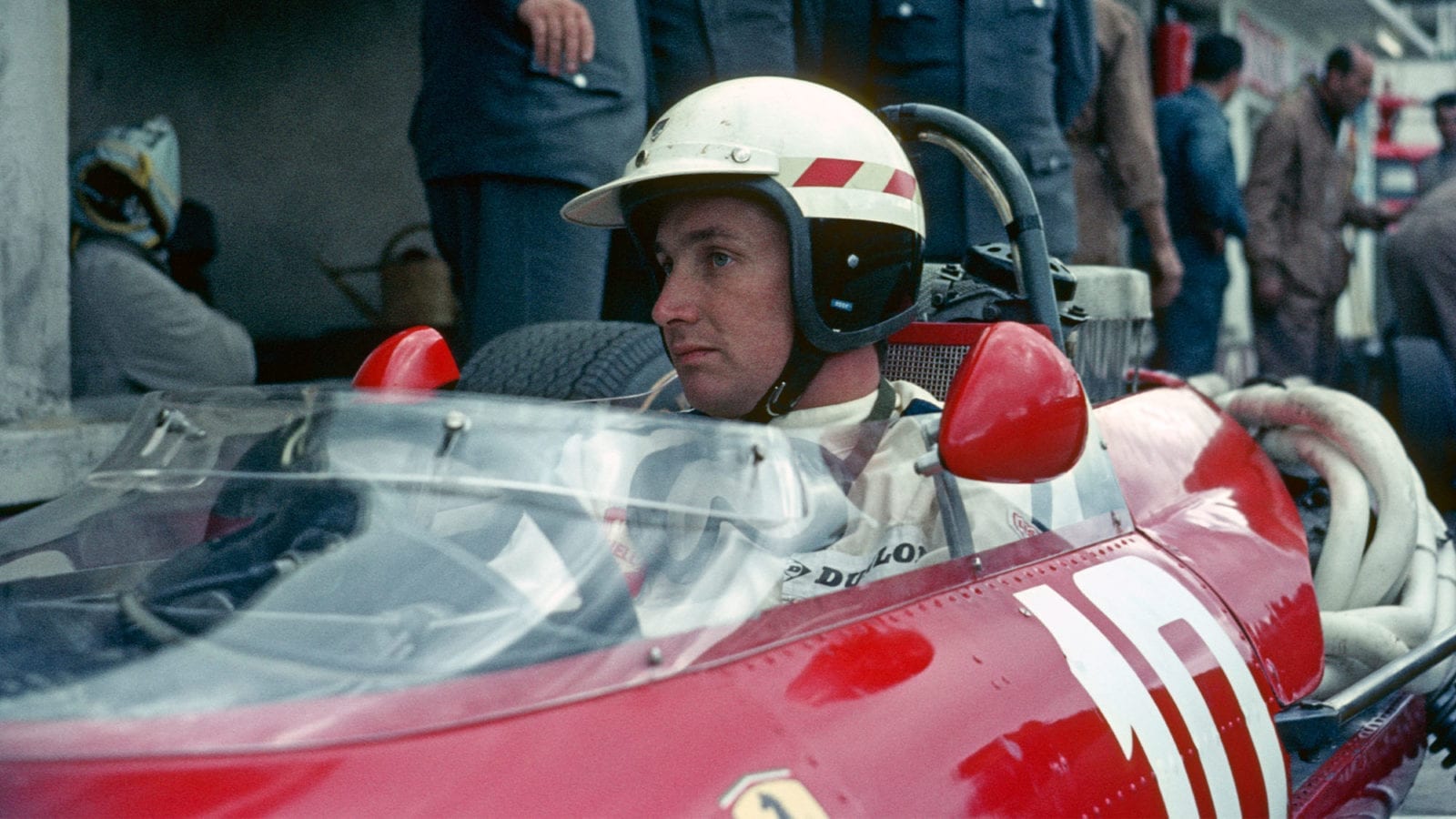 Mike Parkes (Ferrari) in the pits during practice for the 1966 German Grand Prix at the Nurburgring. Photo: Grand Prix Photo