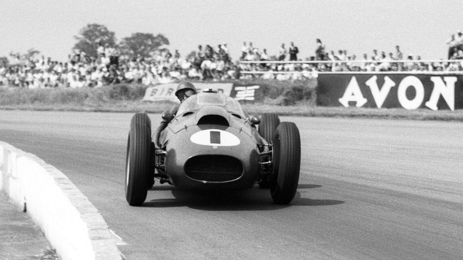 Peter Collins drifts his Ferrari on his way to victory in 1958 British Grand Prix