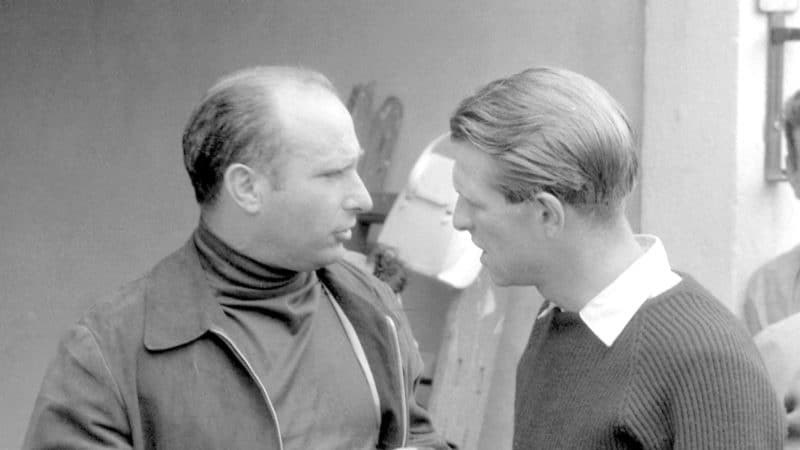 Peter Collins with Juan Manuel Fangio in 1956