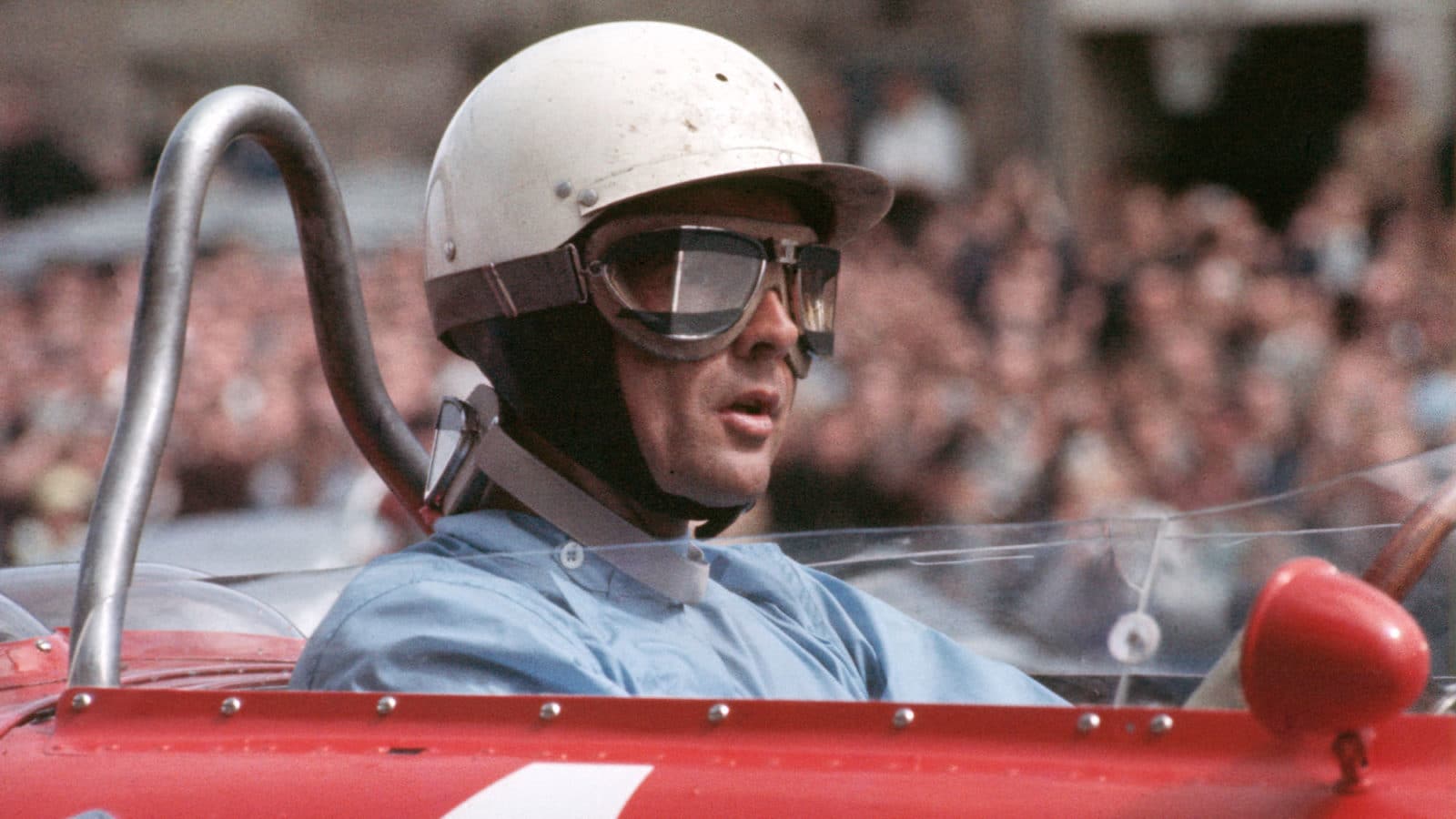 The German Grand Prix; Nürburgring, August 6, 1961. Phil Hill waits for the start. He would finish one second behind his teammate Wolfgang von Trips for third place. (Photo by Klemantaski Collection/Getty Images)