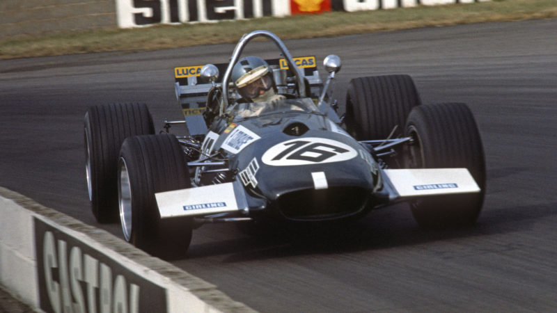 Piers Courage sliding a Williams Brabham round a corner at the 1969 British Grand Prix