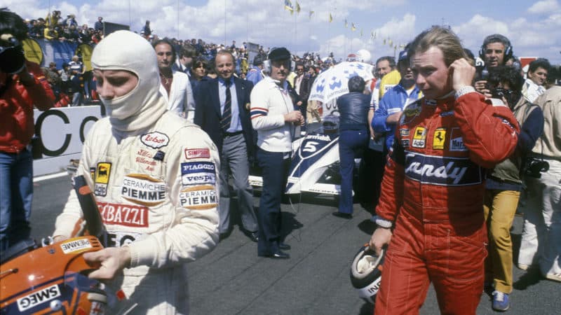 Ferrari drivers Gilles Villeneuve and Didier Pironi leave their cars during the drivers´ protest before the 1981 Belgian Grand Prix at Zolder. Bernie Ecclestone (black jacket, centre) makes sure Nelson Piquet stays in his Brabham-Ford. Photo: Grand Prix Photo