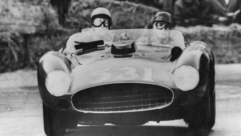 Spanish aristocrat and racing driver Alfonso de Portago, the Marquis of Portago (1928 - 1957) and his co-driver Edmund Nelson in their Ferrari at Peschiera in Italy during the Italian Mille Miglia road race, 12th May 1957. Shortly after the picture was taken, they were both killed, along with several spectators, when their car crashed into the crowd. (Photo by Keystone/Hulton Archive/Getty Images)