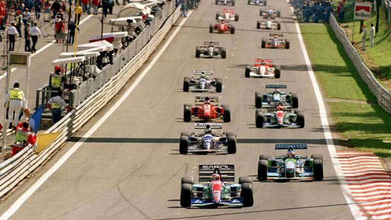 Rubens Barrichello leads Michael Schumacher at the start of 1994 F1 Belgian Grand Prix