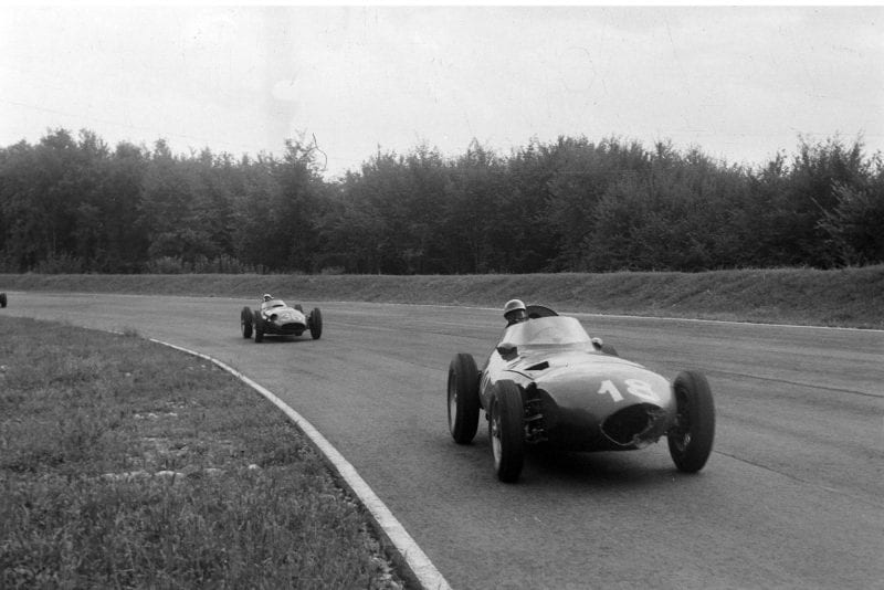 Harry Schell, Vanwall, leads Stirling Moss, Maserati 250F, during the 1956 Italian Grand Prix, Monza.