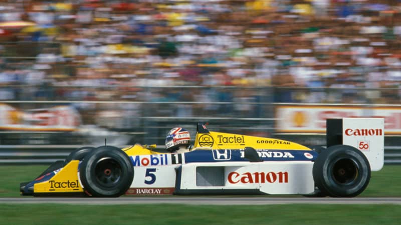 Side view of Nigel Mansell in Williams FW11 in 1987