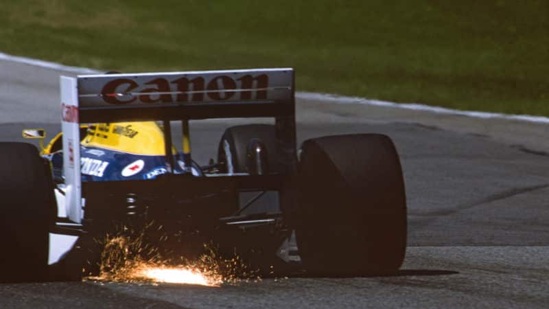 Sparks fly from Williams FW11 in 1987