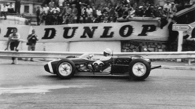 Stirling Moss Lotus 18 in the 1961 Monaco Grand Prix with removed side panels