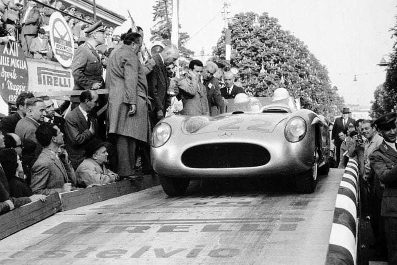 Stirling Moss and and Denis Jenkinson roll off at start of 1955 Mille Miglia Italy