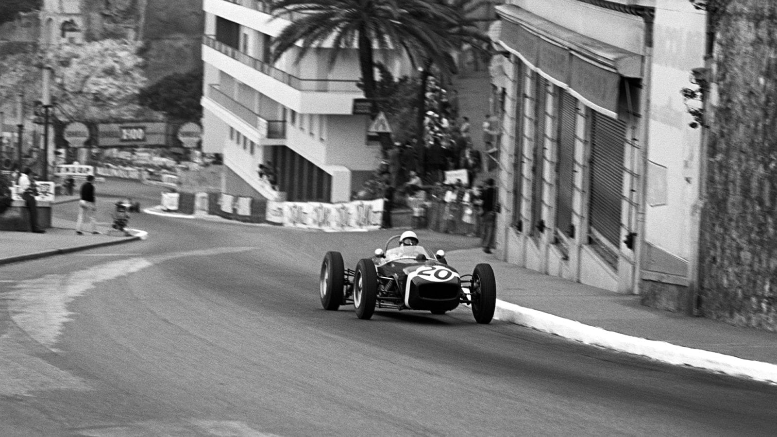 Stirling Moss climbs the hill from Ste Devote in the 1961 Monaco Grand Prix