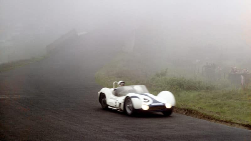 Stirling Moss emerges from the fog at the Nurburgring