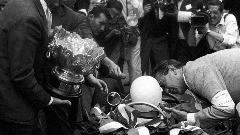 Stirling Moss in his car after winning the 1961 Monaco Grand Prix