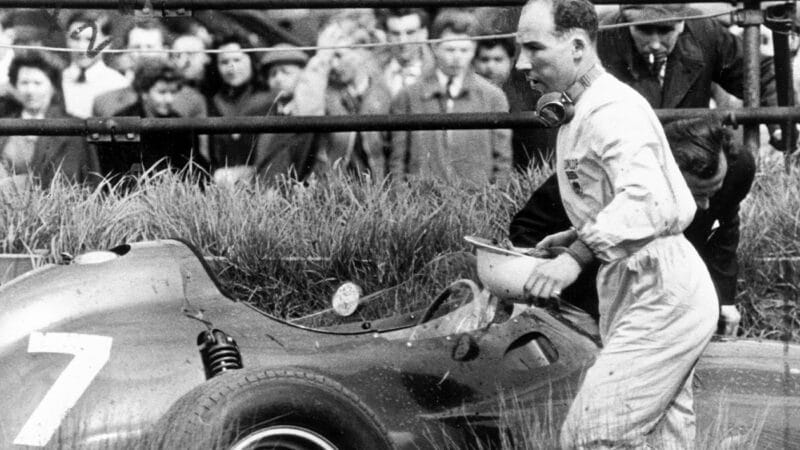 Stirling Moss with crashed BRM at 1959 International Trophy