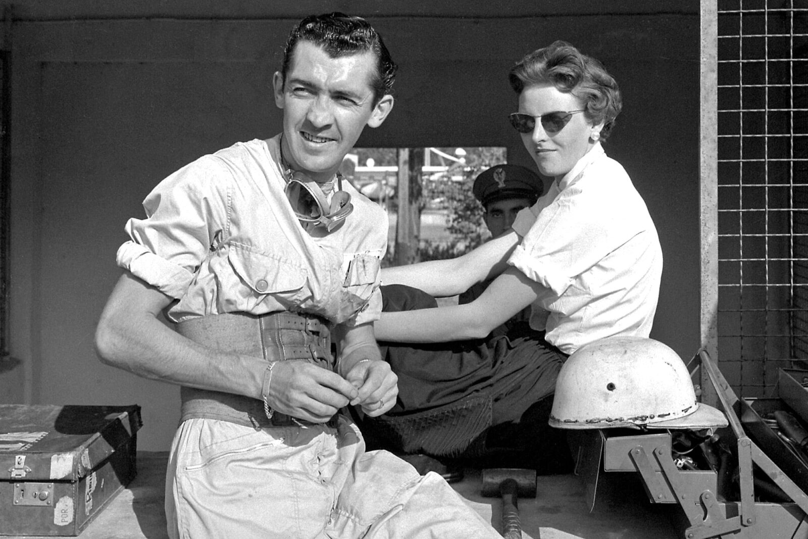 Stuart Lewis-Evans in the pits at Monza with his girlfriend ahead of the 1958 Italian Grand Prix