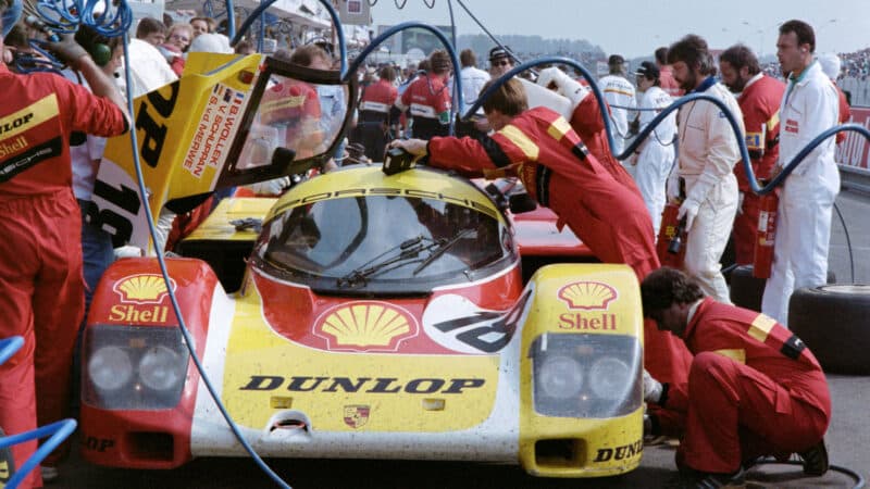 The Porsche 962 C N°18 driven by French Bob Wollek, New Zealand Sarel Van der Merwe and Australian Vern Schuppan makes a pit stop for refuelling as its holds the second position during the 57th edition of the 24 hours of Le Mans