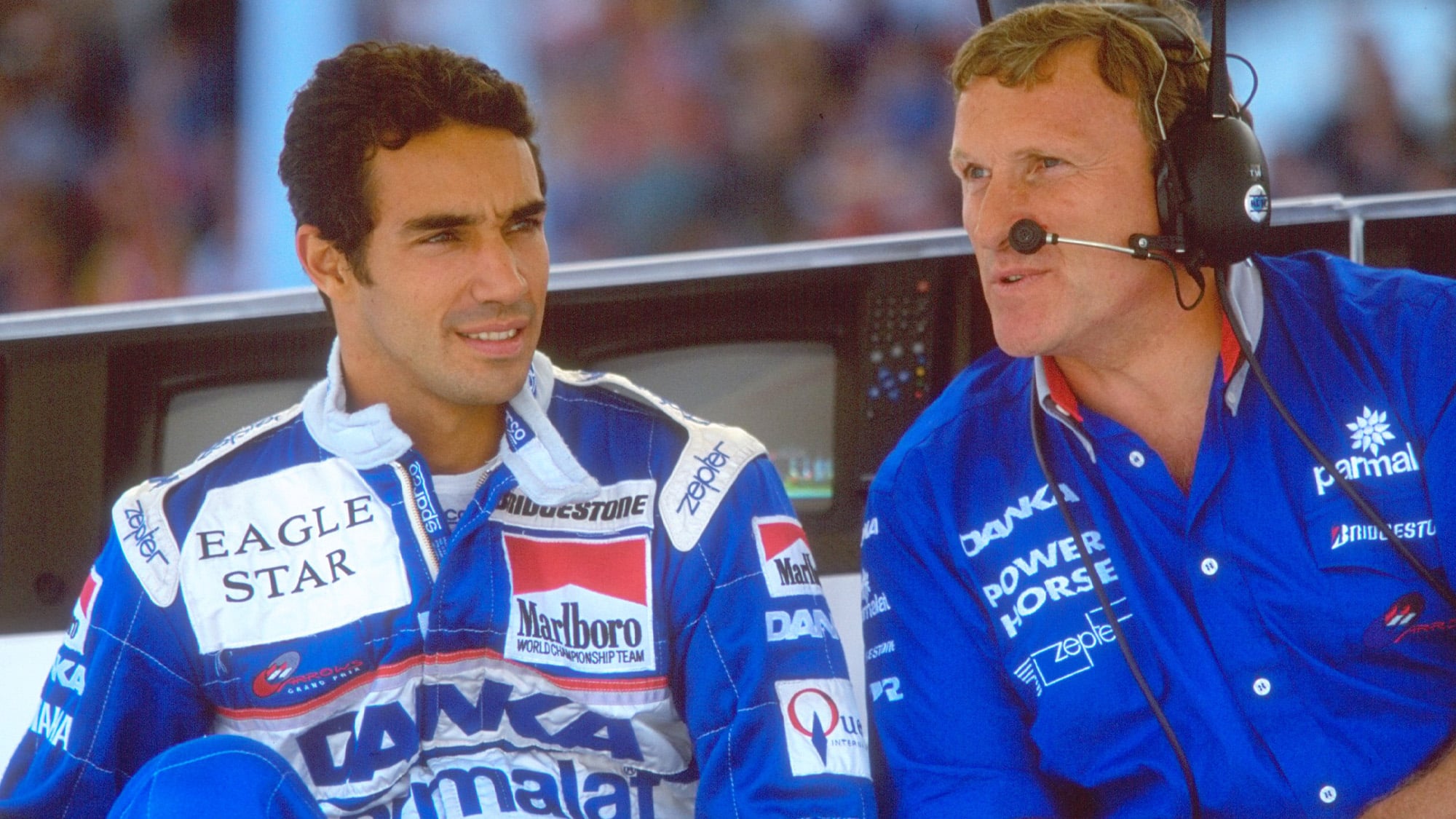 Tom Walkinshaw with Pedro Diniz on the Arrows pitwall in 1997