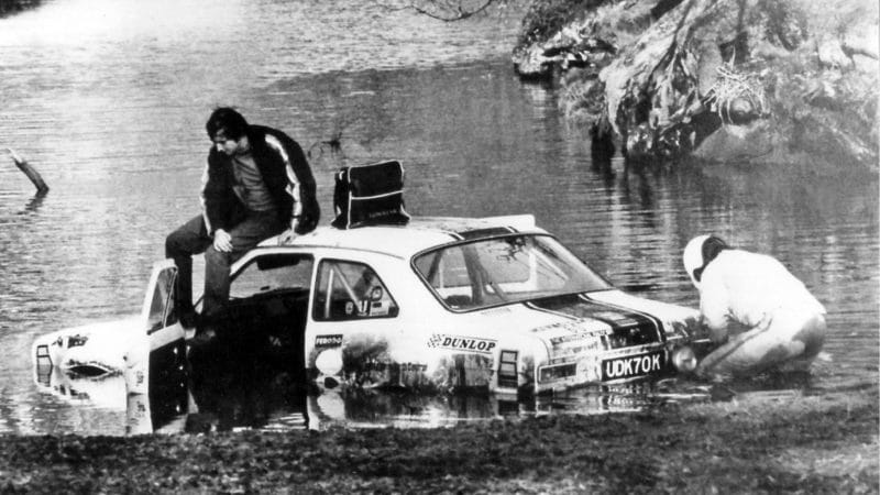 Tony Mason sits on stranded Ford Escort on the 1971 RAC Rally