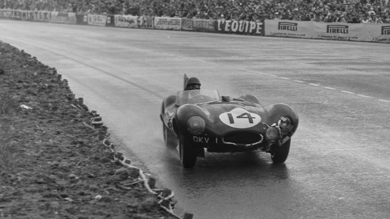 Tony Rolt in Jaguar D-type with broken headlight at 1954 Le Mans 24H