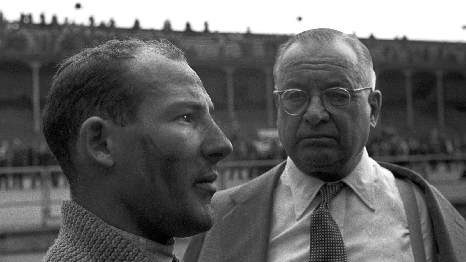 Stirling Moss, Tony Vandervell, Grand Prix of Great Britain, Aintree, England, July 20, 1957. Stirling Moss and Vanwall owner Tony Vandervell. (Photo by Bernard Cahier/Getty Images)