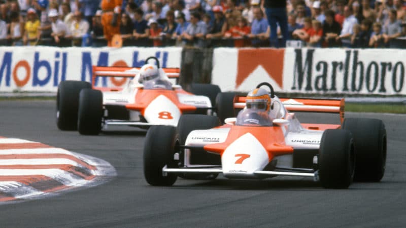 John Watson leads McLaren-Mercedes team-mate Andrea de Cesaris in the 1981 British Grand Prix in Silverstone. Photo: Grand Prix Photo