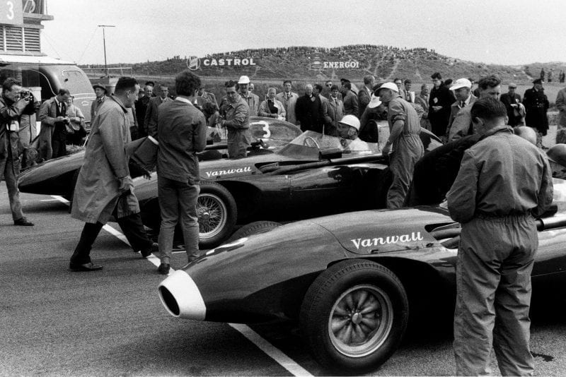 A Vanwall front row, Tony Brooks in VW7, Stirling Moss, in aVW10, and Stuart Lewis-Evans, Vanwall VW5, on the grid before the start.
